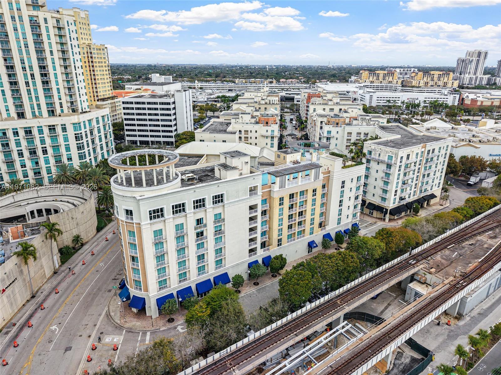 7275 Southwest 90th Way, Unit 404 Miami, FL 33156 - Photo 32 of 35 a view of a city with tall buildings