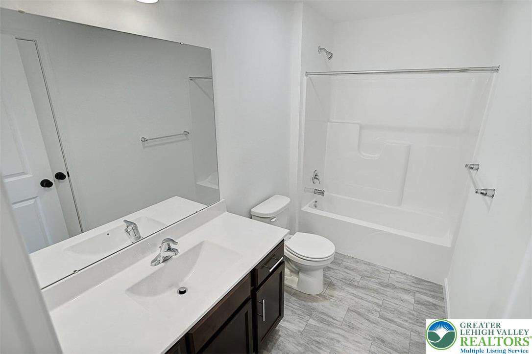 253 West Center Road, Unit LOT 123 Northampton, PA 18067 - Photo 16 of 16 a bathroom with a sink toilet and shower