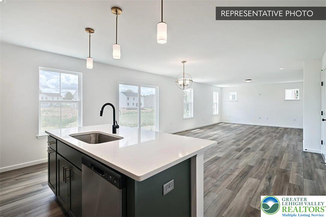 253 West Center Road, Unit LOT 123 Northampton, PA 18067 - Photo 7 of 16 a kitchen with a sink a counter space and appliances