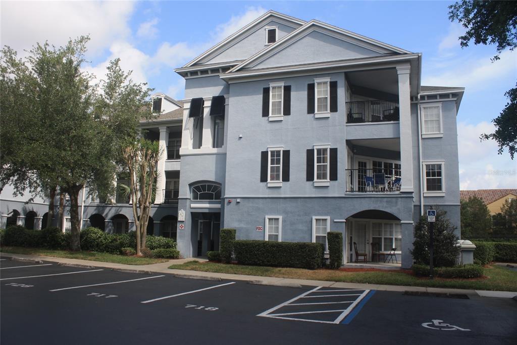 3621 Conroy Road, Unit 739 Orlando, FL 32839 - Photo 1 of 20 a front view of a house with a garden