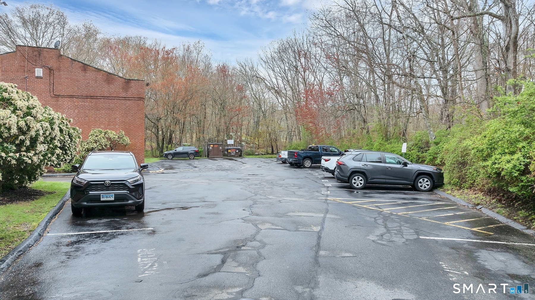 111 Niles Hill Road, Unit E New London, CT 06320 - Photo 9 of 26 a couple of cars parked in a yard