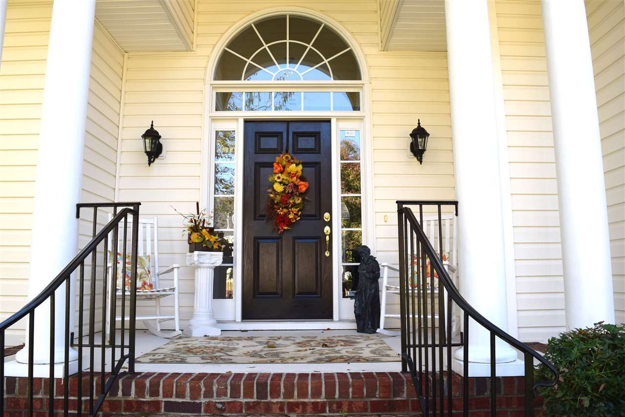 620 Middle Bridge Road Wake Forest, NC 27587 - Photo 2 of 25 Close up showing the columns and lots of room for rocking chairs on this front porch, Front Entry