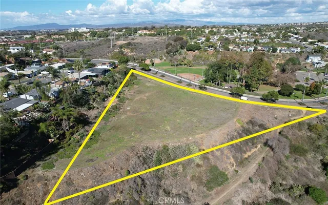 a view of a swimming pool and an outdoor seating