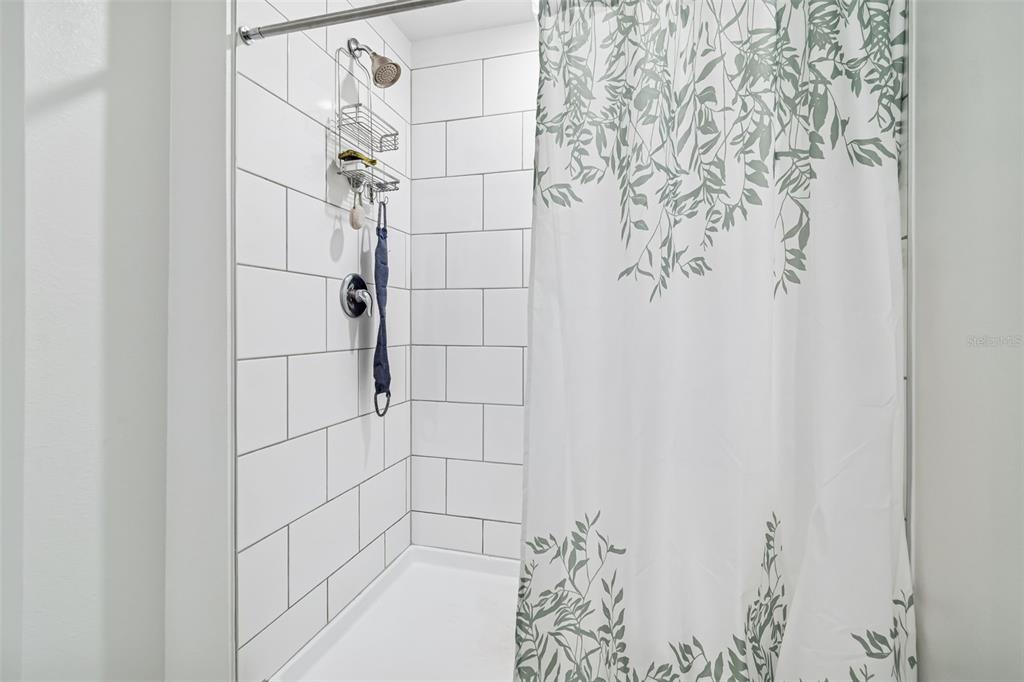 4530 Cozy Condor Court Bartow, FL 33830 - Photo 16 of 35 a bathroom with a shower