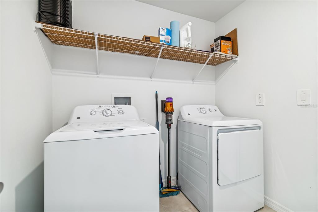 4530 Cozy Condor Court Bartow, FL 33830 - Photo 17 of 35 a utility room with dryer and washer