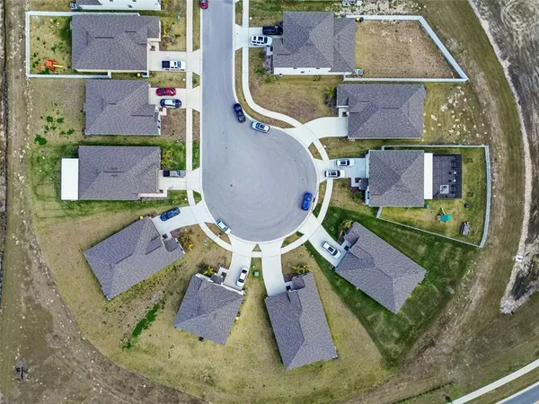 a park view with a bench in a garden