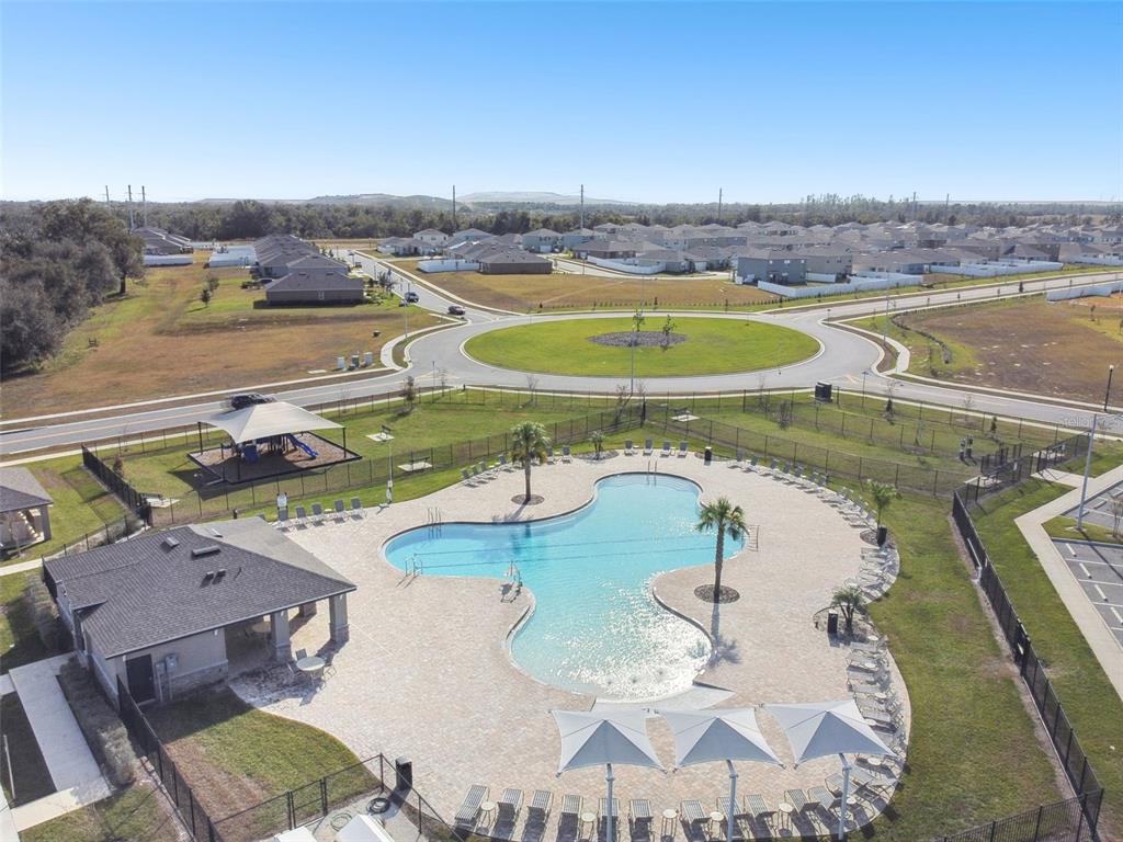 4530 Cozy Condor Court Bartow, FL 33830 - Photo 34 of 35 a view of a swimming pool with a balcony