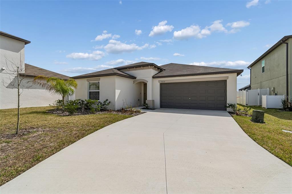 4530 Cozy Condor Court Bartow, FL 33830 - Photo 35 of 35 a front view of a house with garden