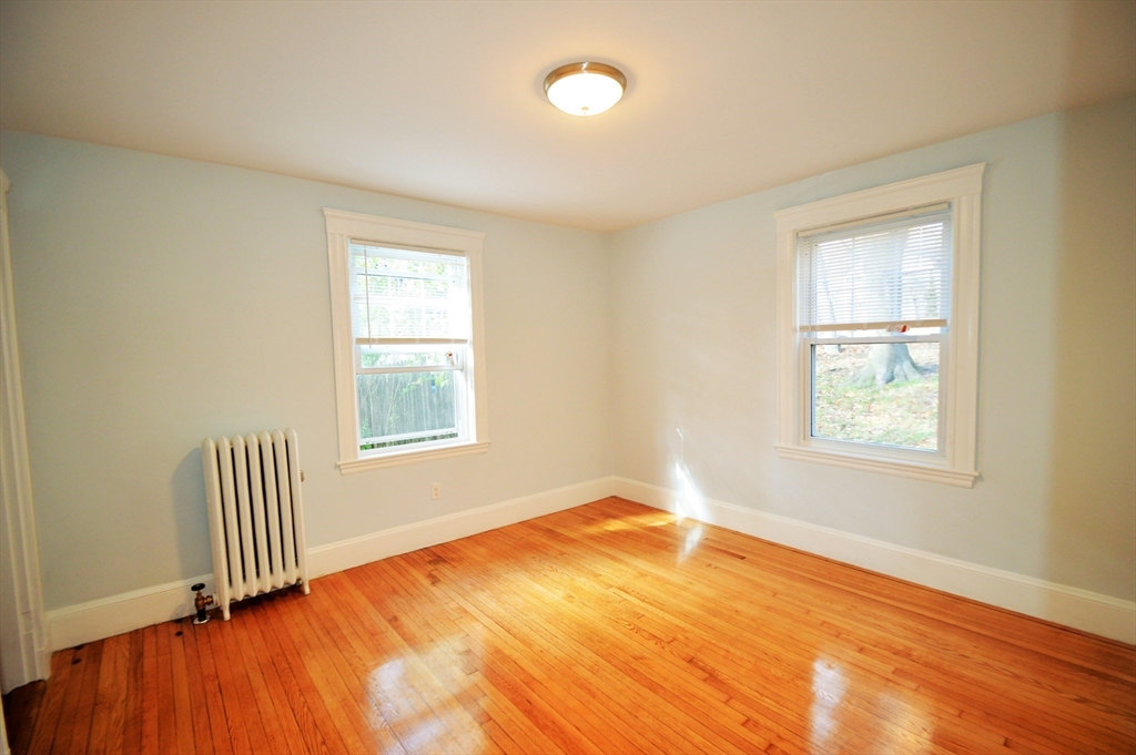 51 Leamington Road, Unit 1 Boston, MA 02135 - Photo 10 of 12 a view of an empty room and window