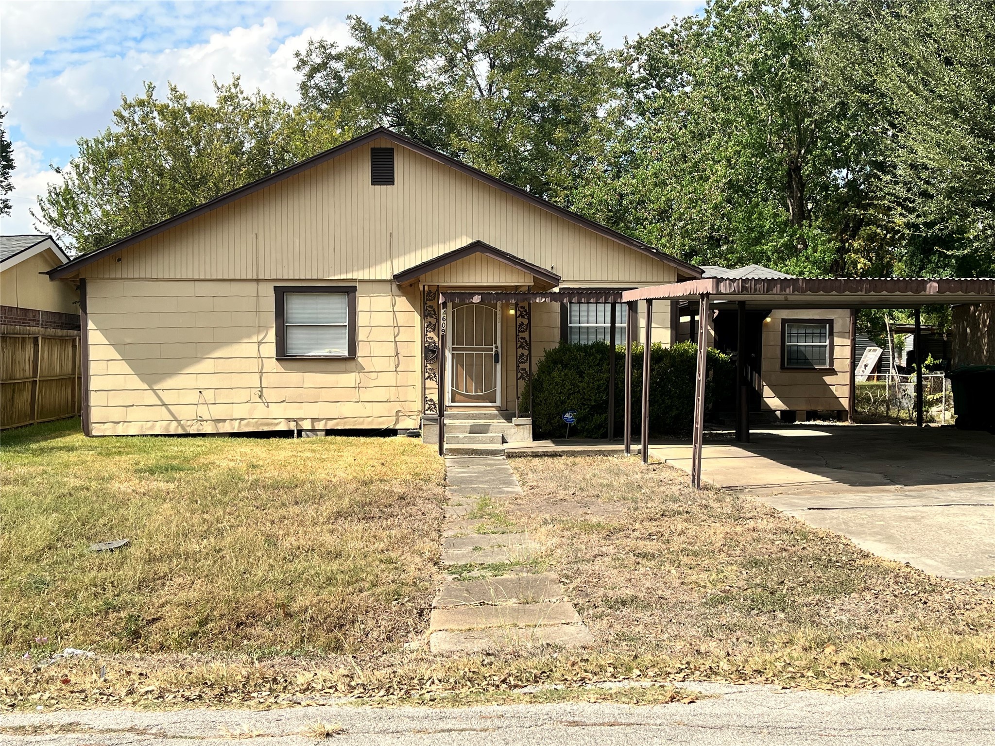 4609 Dabney Street Houston, TX 77026 - Photo 2 of 19 a front view of a house with a yard