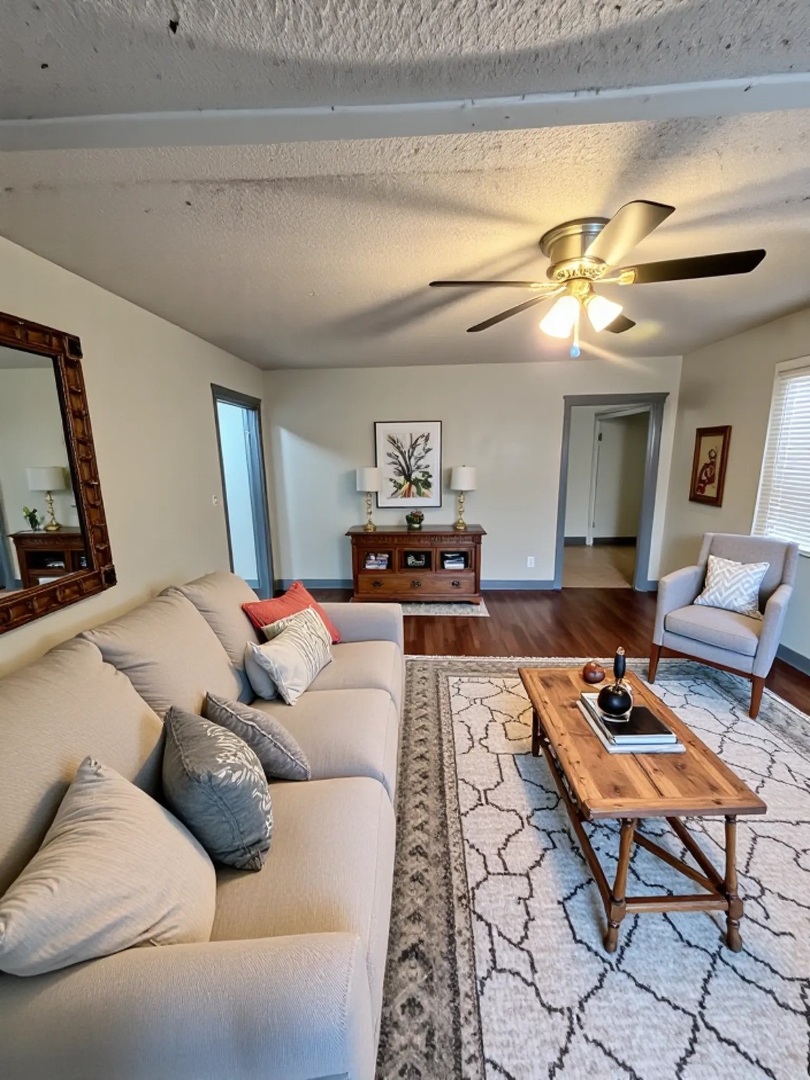 4609 Dabney Street Houston, TX 77026 - Photo 3 of 19 a living room with furniture and a chandelier