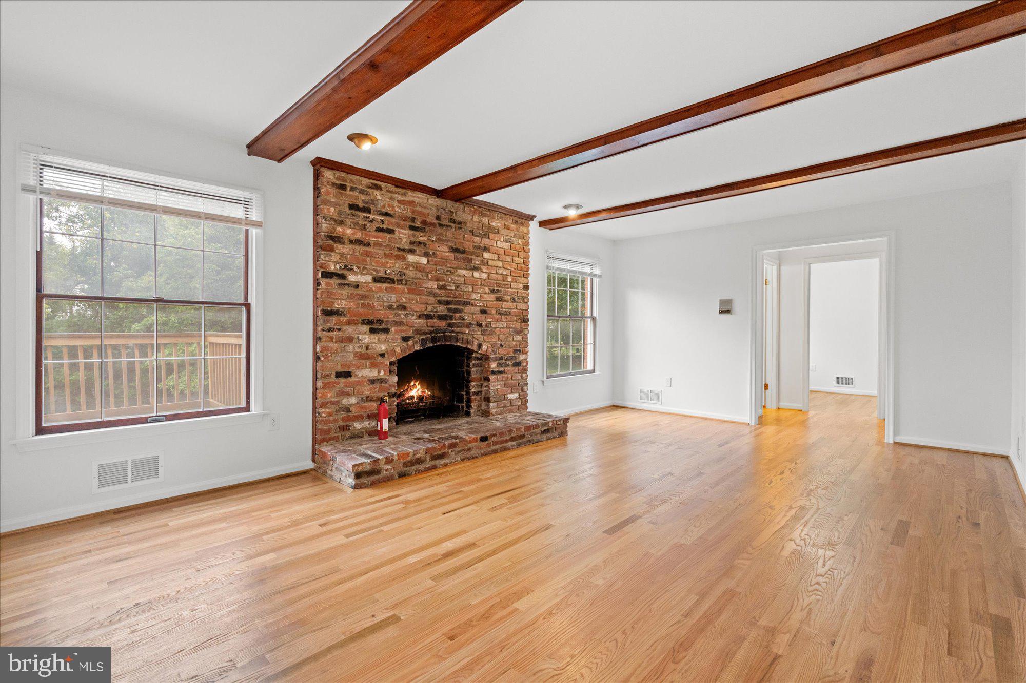 9601 Persimmon Tree Road Potomac, MD 20854 - Photo 18 of 52 Great room with fireplace