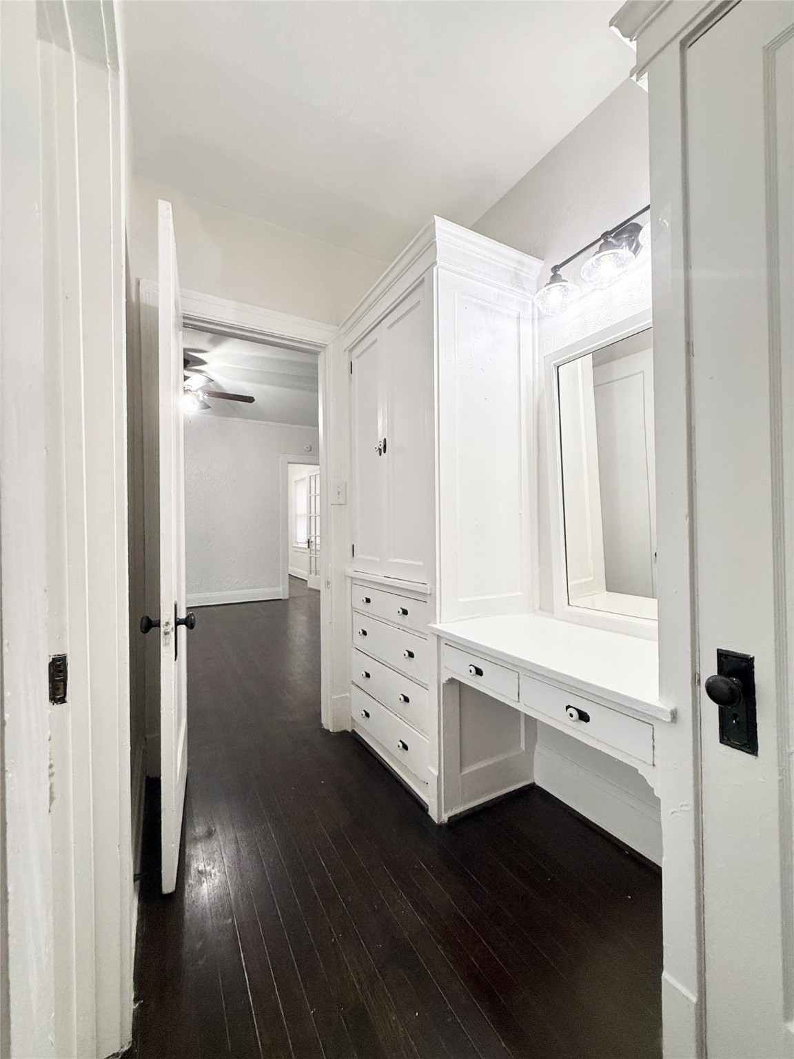 3920 Fannin Street, Unit 103 Houston, TX 77004 - Photo 19 of 24 a view of an empty room with wooden floor and a window