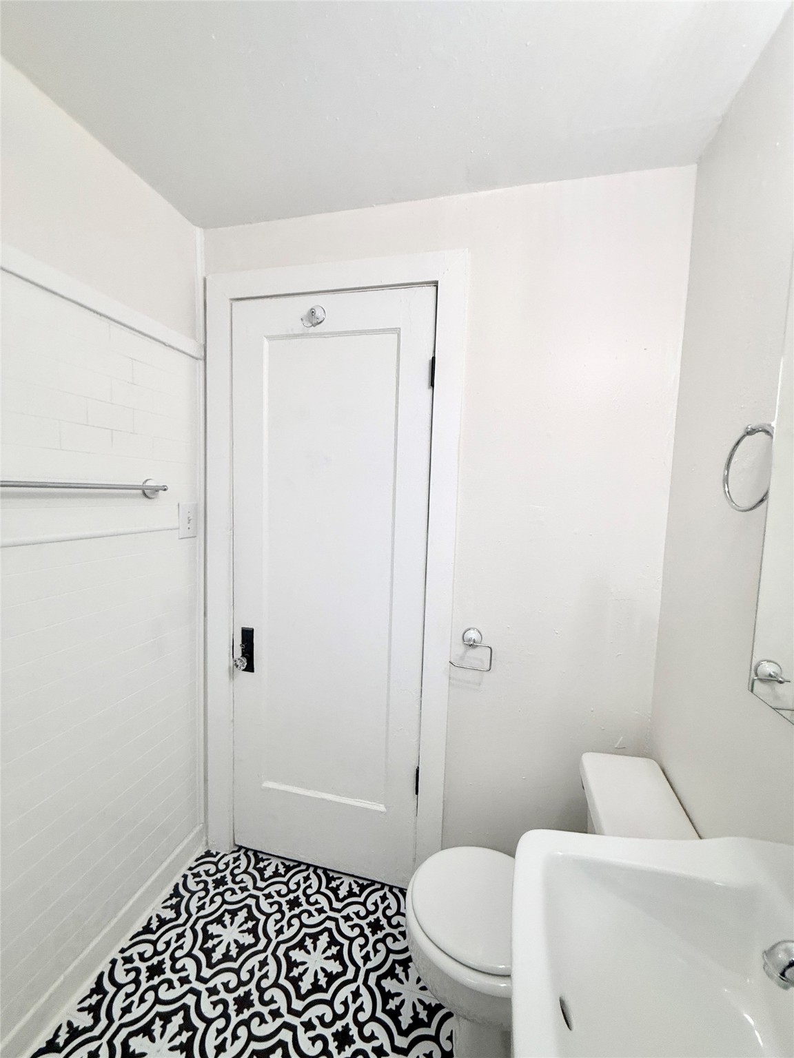3920 Fannin Street, Unit 103 Houston, TX 77004 - Photo 24 of 24 a bathroom with a toilet and a shower