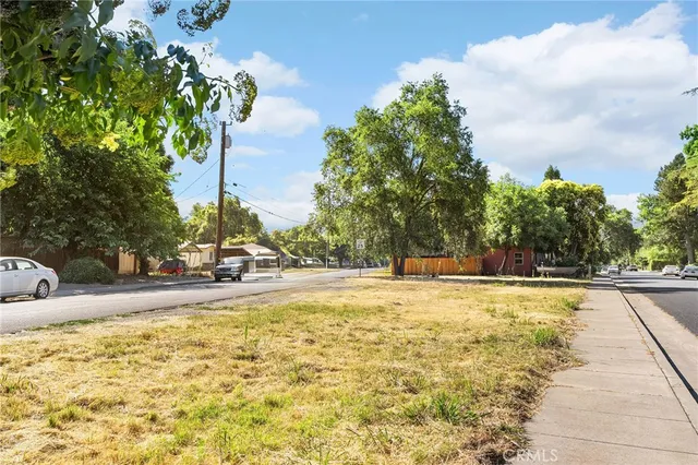 a view of a swimming pool with an outdoor space and seating area