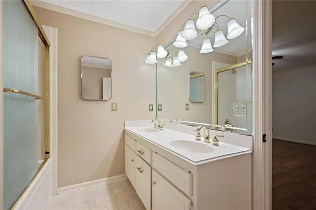a bathroom with a sink vanity and a mirror