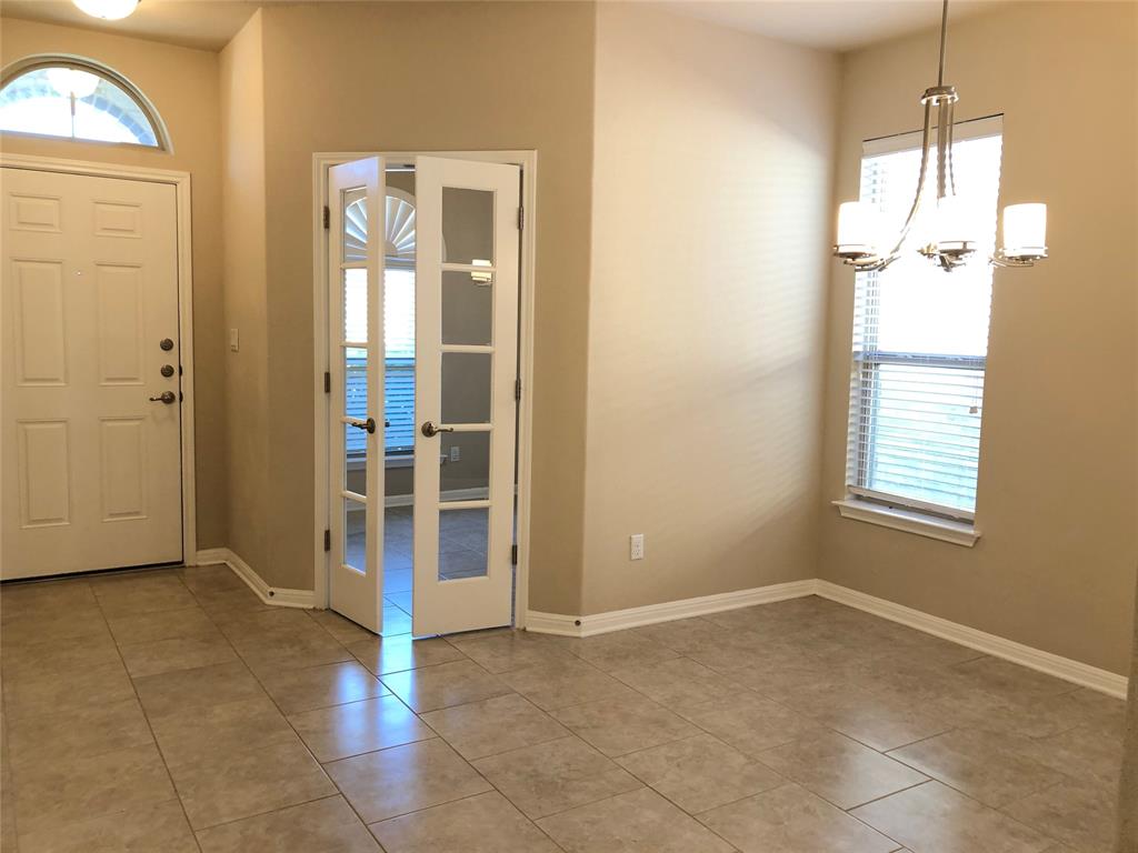 3451 Mayfield Ranch Boulevard, Unit 340 Round Rock, TX 78681 - Photo 2 of 13 A graceful entry welcomes guests, revealing an adjoining office plus flex space perfect for dining or a home office.