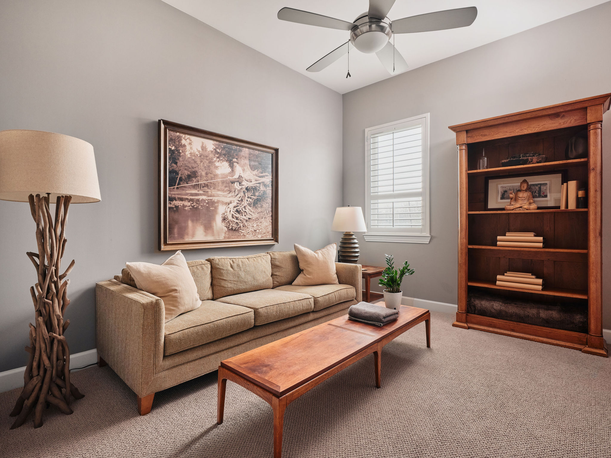 1504 Collier Street, Unit 4 Austin, TX 78704 - Photo 20 of 38 Living area with carpet flooring and ceiling fan