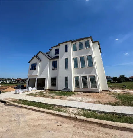 a view of a building with a yard