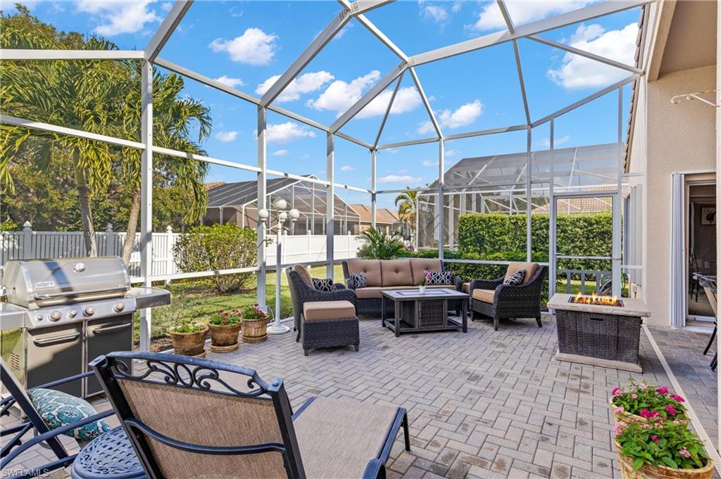 96 Glen Eagle Circle Naples, FL 34104 - Photo 19 of 33 a outdoor space with patio the couches and a potted plant