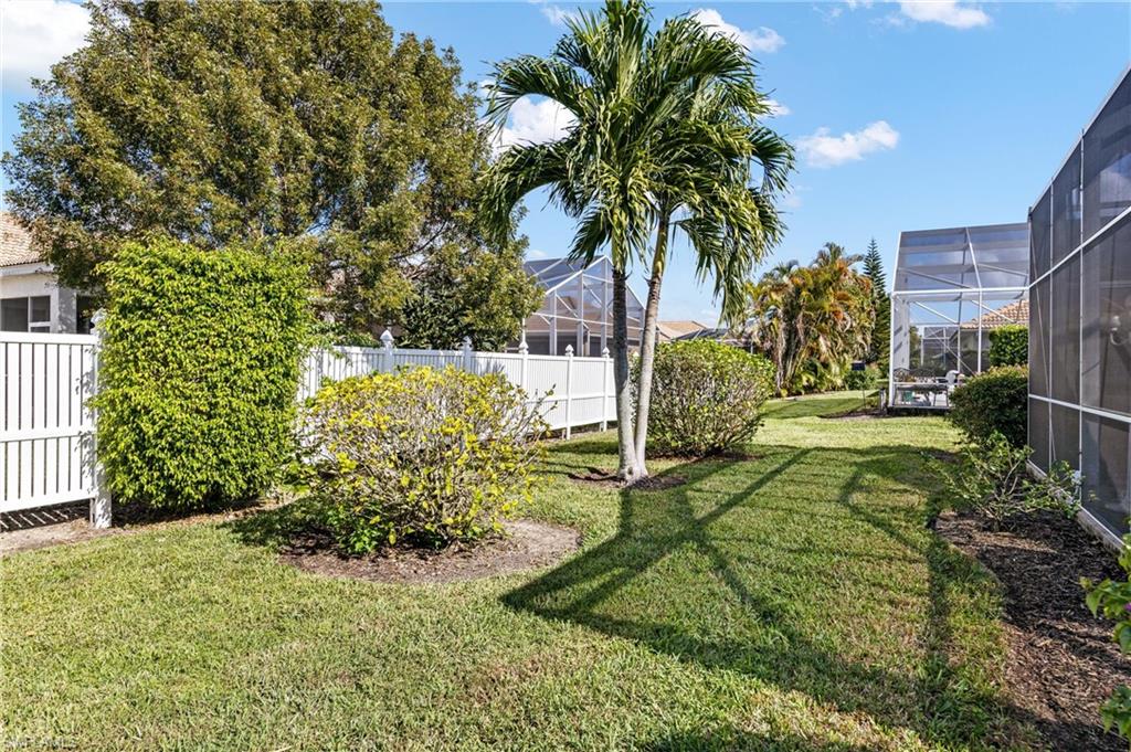 96 Glen Eagle Circle Naples, FL 34104 - Photo 24 of 33 a view of a yard in front of a house
