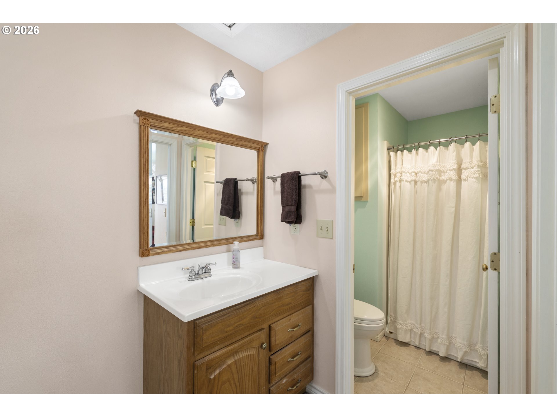 4515 Cordon Road Northeast Salem, OR 97305 - Photo 21 of 48 a bathroom with a sink mirror and vanity