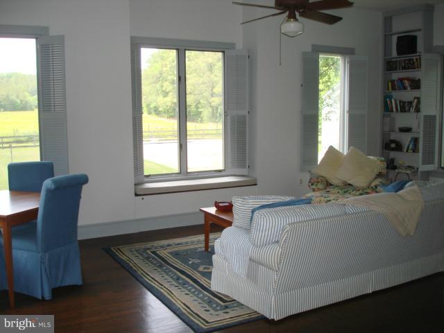 49588 Will's Road Dameron, MD 20628 - Photo 3 of 30 a living room with furniture and a window