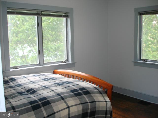 49588 Will's Road Dameron, MD 20628 - Photo 24 of 30 a bedroom with a bed and a window