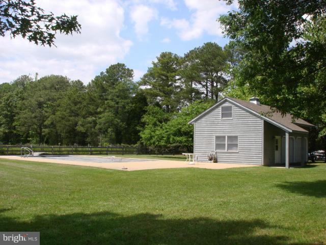 49588 Will's Road Dameron, MD 20628 - Photo 26 of 30 a front view of a house with a yard