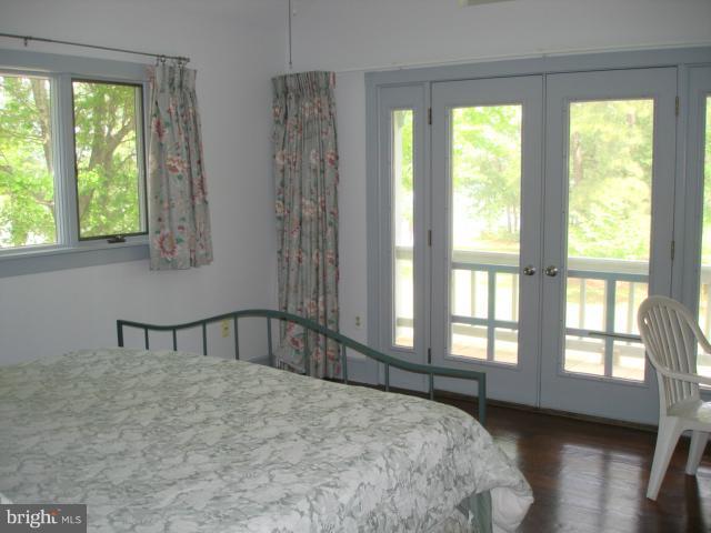 49588 Will's Road Dameron, MD 20628 - Photo 6 of 30 a bedroom with a bed and a window