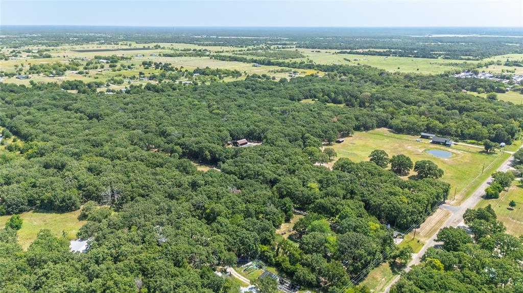 1516 Rancho Road Quinlan, TX 75474 - Photo 5 of 40 a view of a field with an ocean view