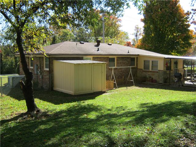 155 North Greenhill Road Mount Juliet, TN 37122 - Photo 14 of 16 Covered patio located in the rear of the home.