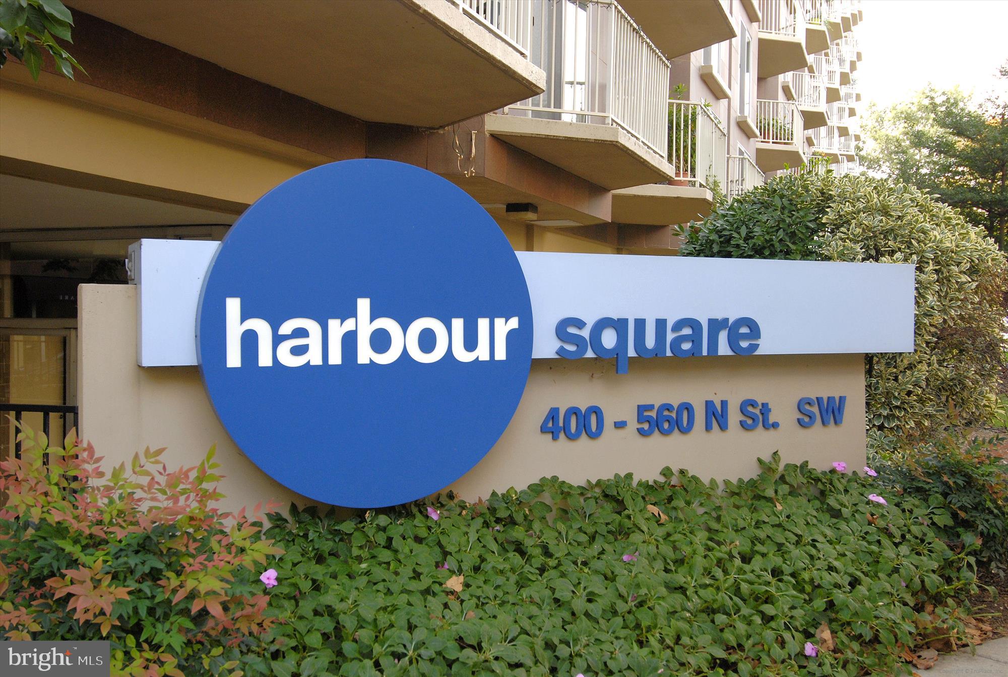 a sign on the wall of building