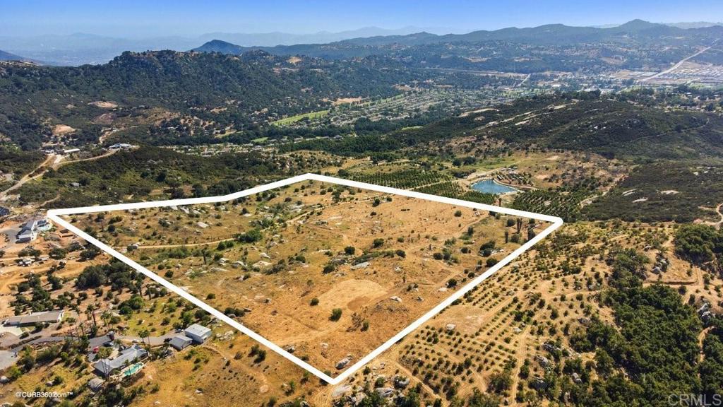 27825 Cool Water Ranch Road Valley Center, CA 92082 - Photo 1 of 1 a view of a large body of water with a mountain