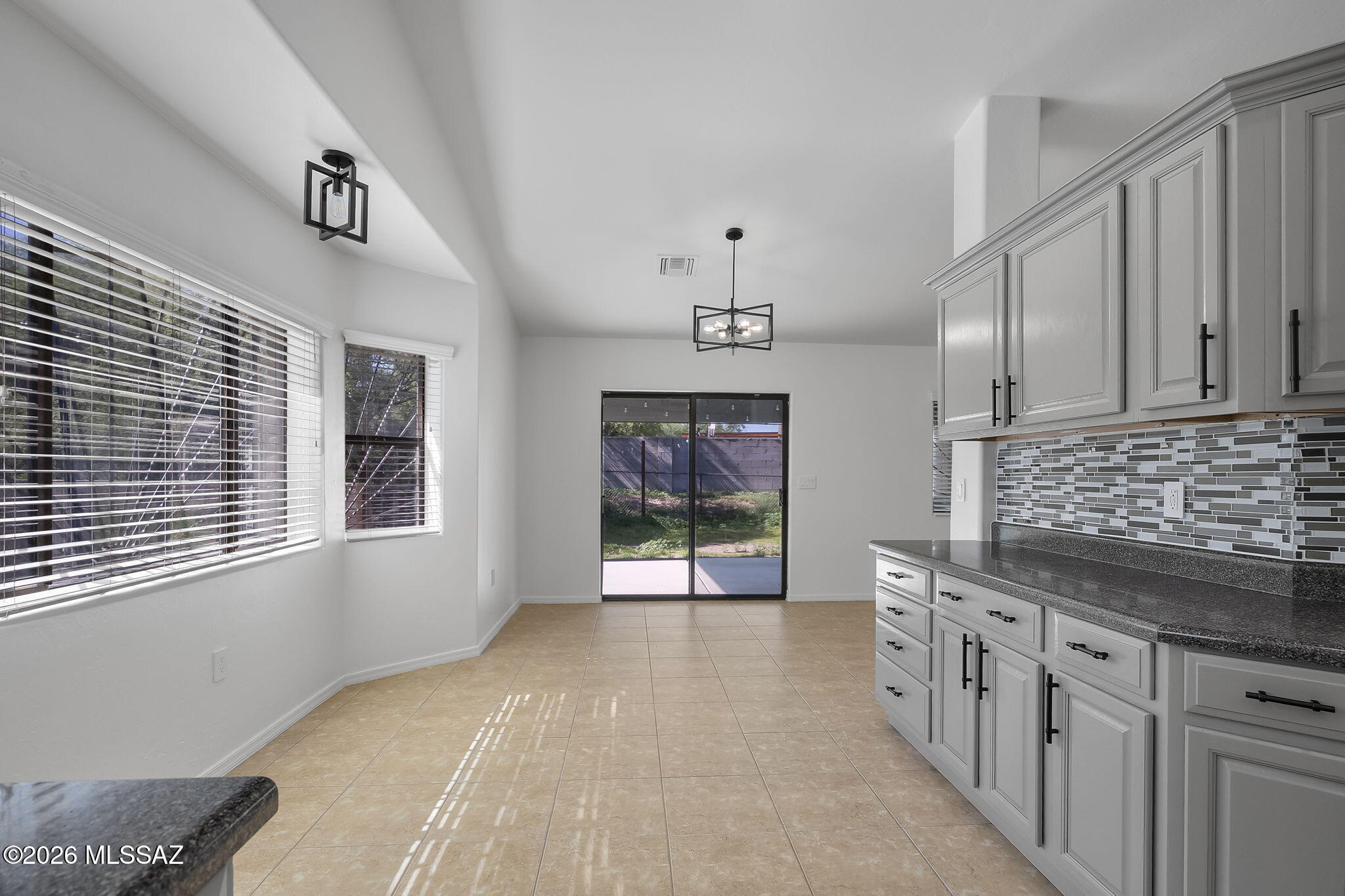 1079 Paseo Freno Rio Rico, AZ 85648 - Photo 8 of 28 KItchen to dining area
