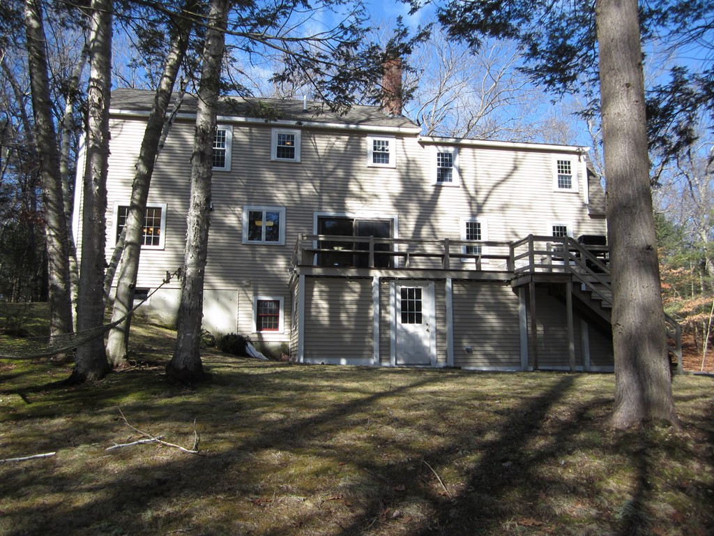 27 Janes Road Boxford, MA 01921 - Photo 15 of 15 a front view of a house with a yard
