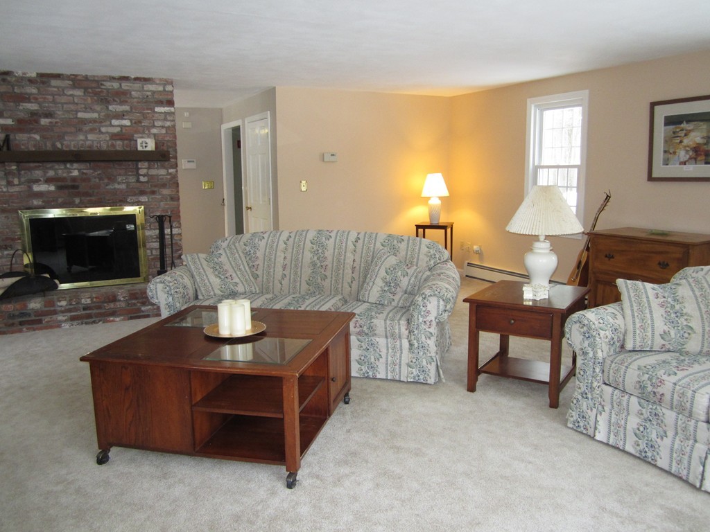 27 Janes Road Boxford, MA 01921 - Photo 3 of 15 a living room with furniture and a fireplace