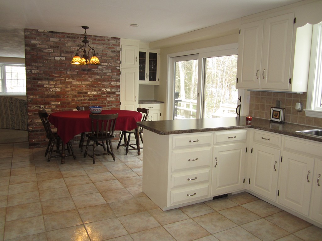 27 Janes Road Boxford, MA 01921 - Photo 6 of 15 a kitchen with cabinets and window