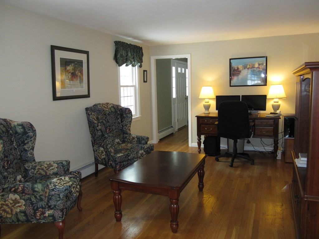27 Janes Road Boxford, MA 01921 - Photo 7 of 15 a living room with furniture piano and a window