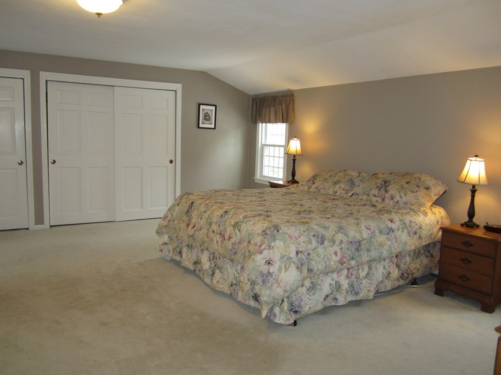 27 Janes Road Boxford, MA 01921 - Photo 9 of 15 a bedroom with a bed and a window