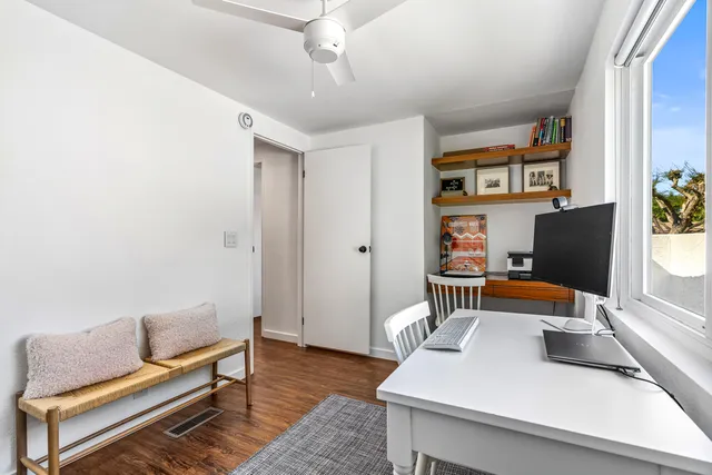 a bed room with a bed and a couch