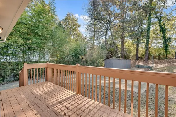 a view of a wooden roof deck