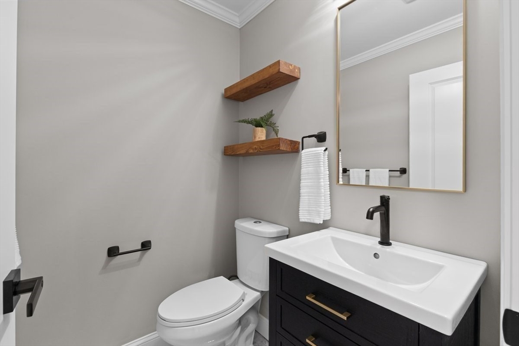 Lot 12 Brookside Lane Norfolk, MA 02056 - Photo 11 of 42 a bathroom with a sink a toilet and mirror