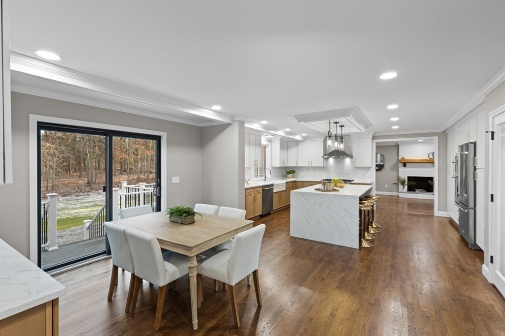Lot 12 Brookside Lane Norfolk, MA 02056 - Photo 12 of 42 a kitchen with a table and chairs in it