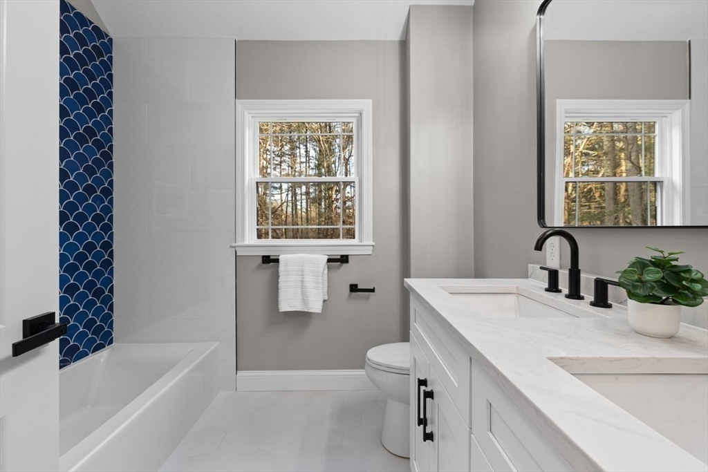 Lot 12 Brookside Lane Norfolk, MA 02056 - Photo 26 of 42 a bathroom with a sink a toilet and shower