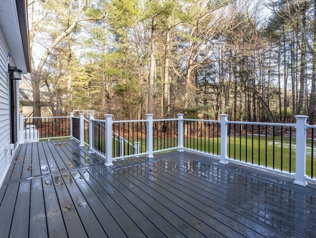 Lot 12 Brookside Lane Norfolk, MA 02056 - Photo 39 of 42 a balcony with wooden floor and fence