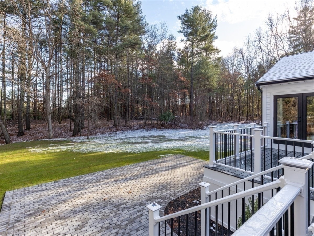 Lot 12 Brookside Lane Norfolk, MA 02056 - Photo 40 of 42 a view of a swimming pool with a deck and wooden fence