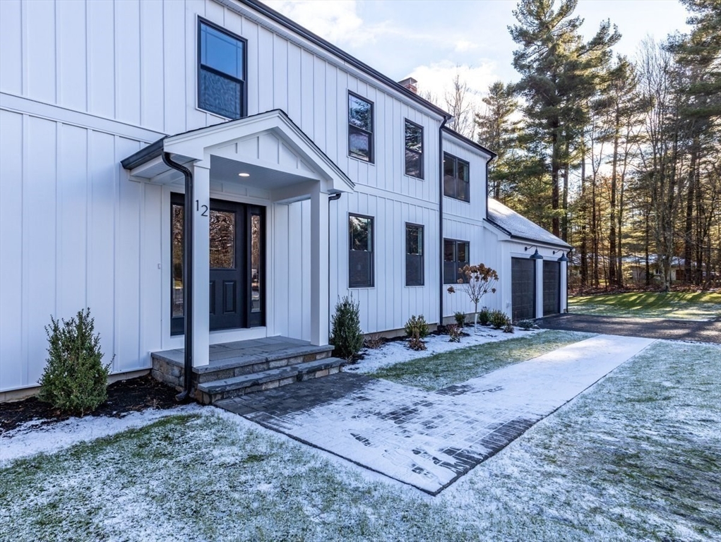 Lot 12 Brookside Lane Norfolk, MA 02056 - Photo 4 of 42 a front view of a house with garden