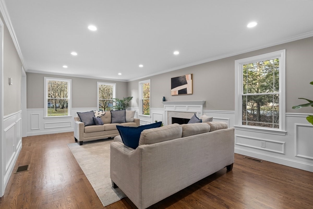 Lot 12 Brookside Lane Norfolk, MA 02056 - Photo 10 of 42 a living room with furniture and a fireplace