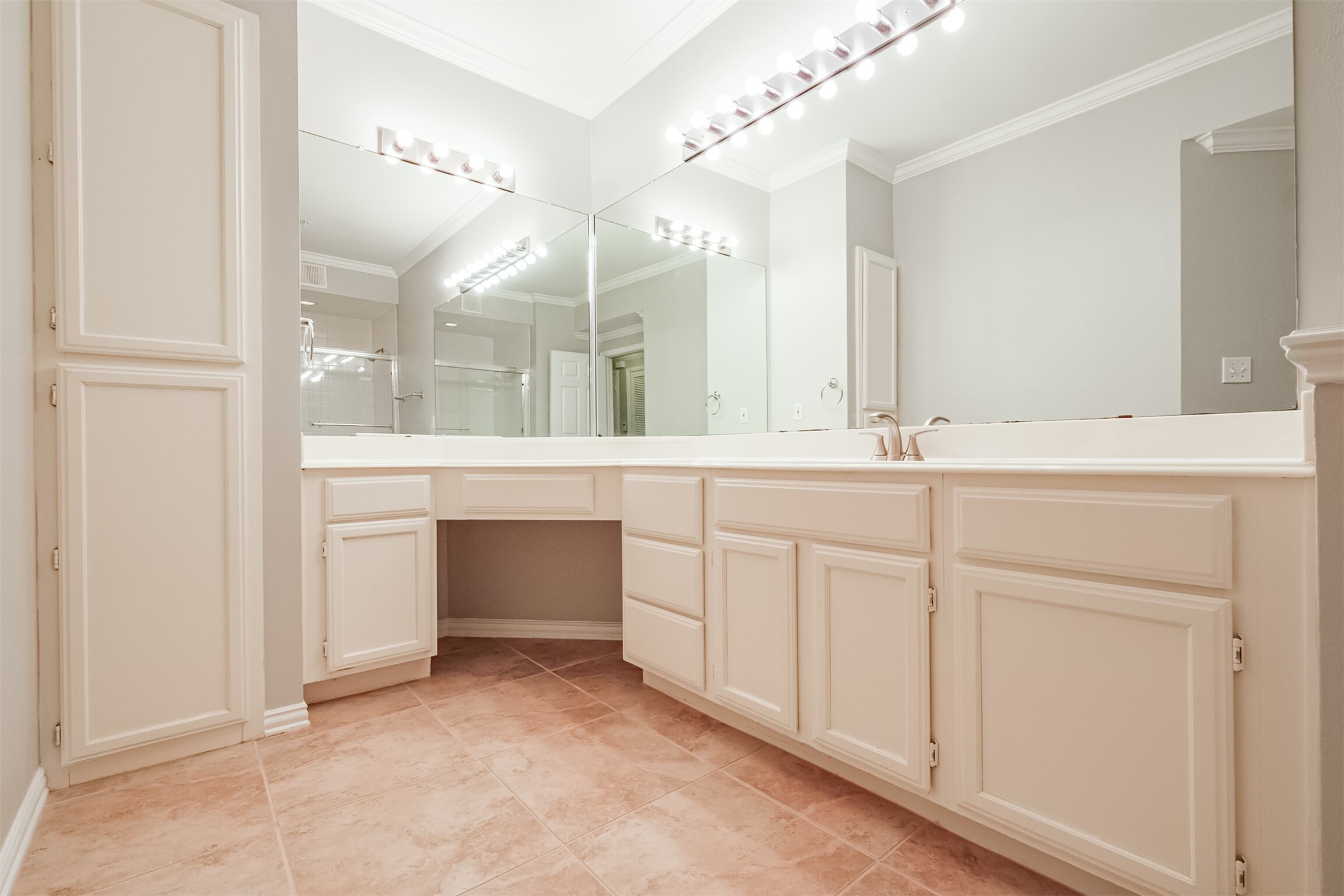 2111 Welch Street, Unit B304 Houston, TX 77019 - Photo 21 of 37 a bathroom with a sink and a mirror